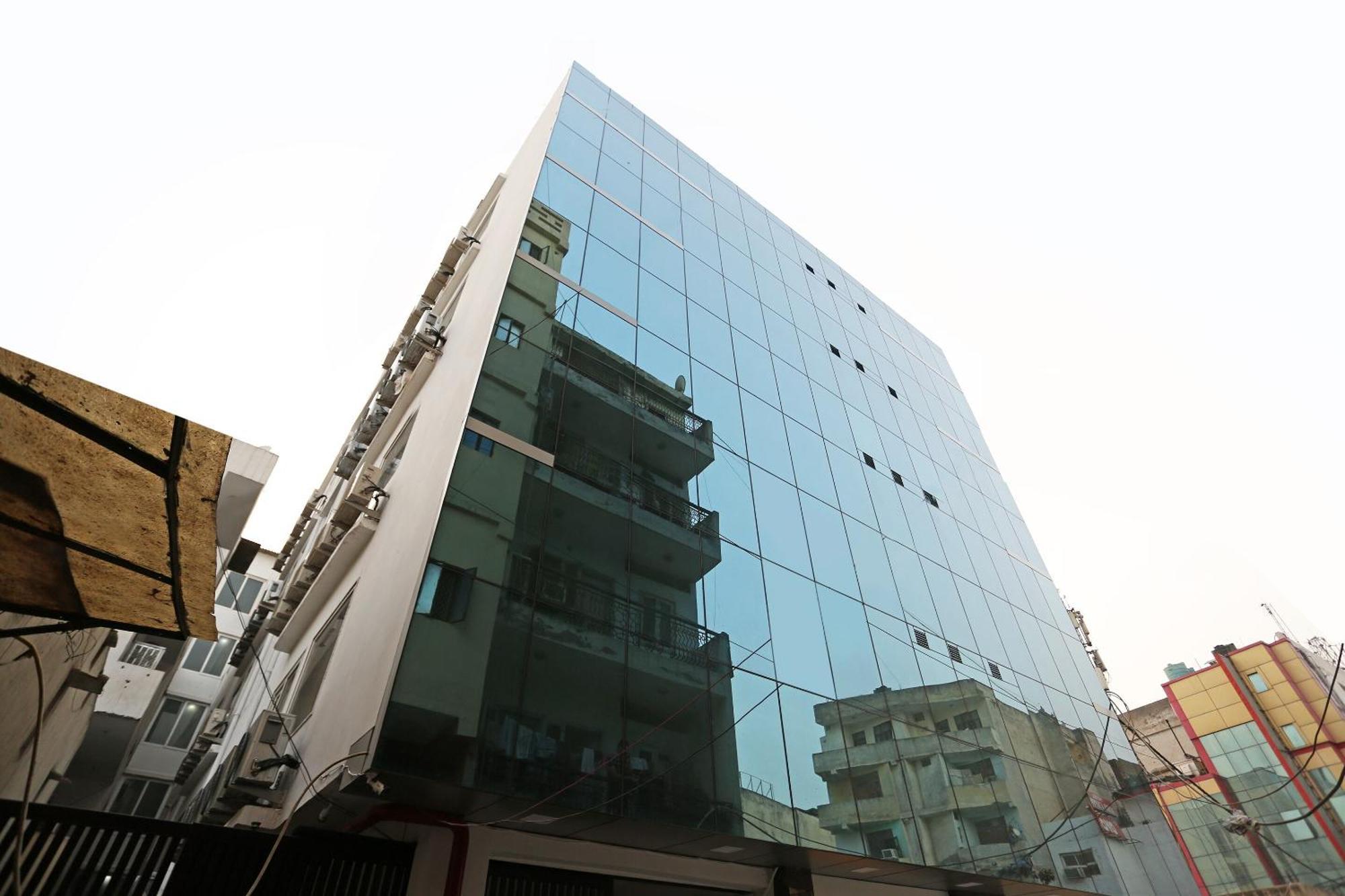 Hotel O M Suites Nueva Delhi Exterior foto